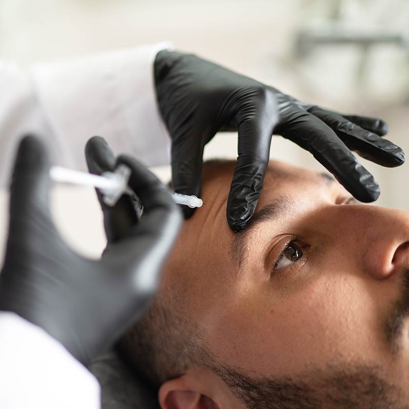 Botox for Men man getting Botox Injection at Glow Dermspa in Florida